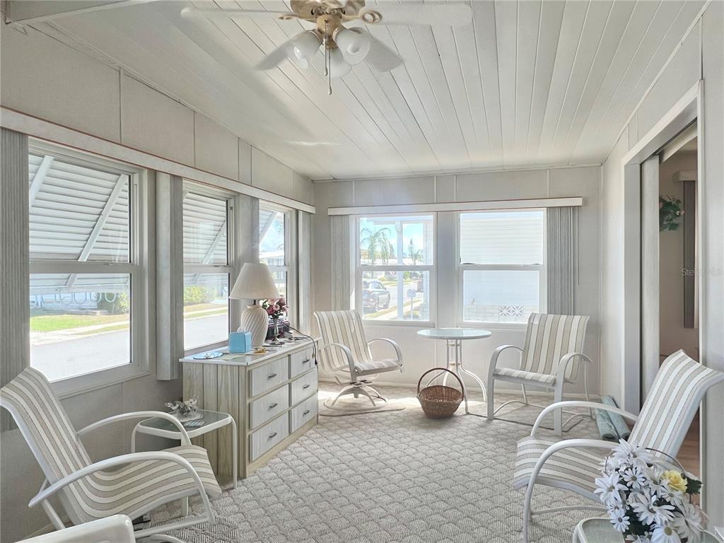 1100 South Belcher Road, Unit 197 Largo, FL 33771 - Photo 24 of 60 a living room with furniture and a large window