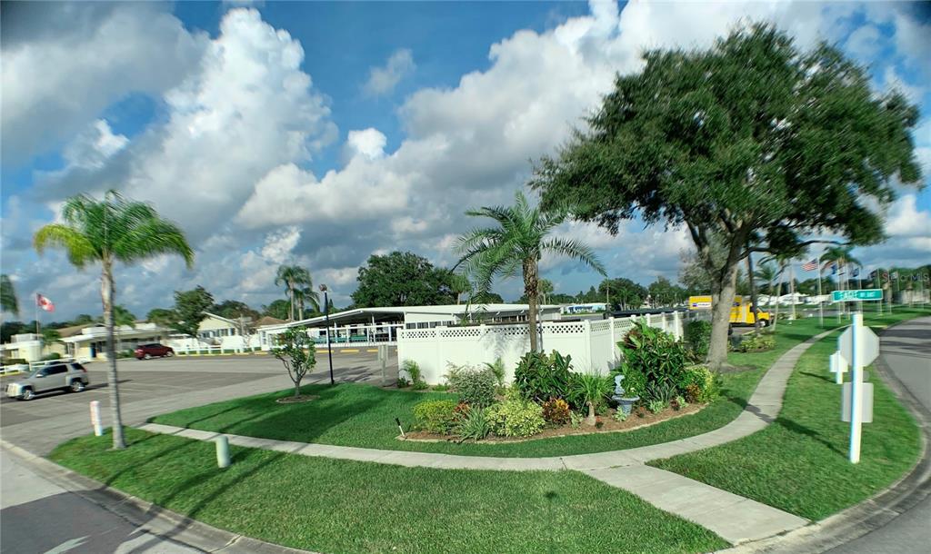 1100 South Belcher Road, Unit 197 Largo, FL 33771 - Photo 34 of 60 a view of a swimming pool and a yard