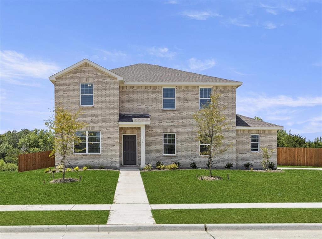 2561 Cinnamon Spgs Road Glenn Heights, TX 75154 - Photo 1 of 1 a front view of a house with a yard
