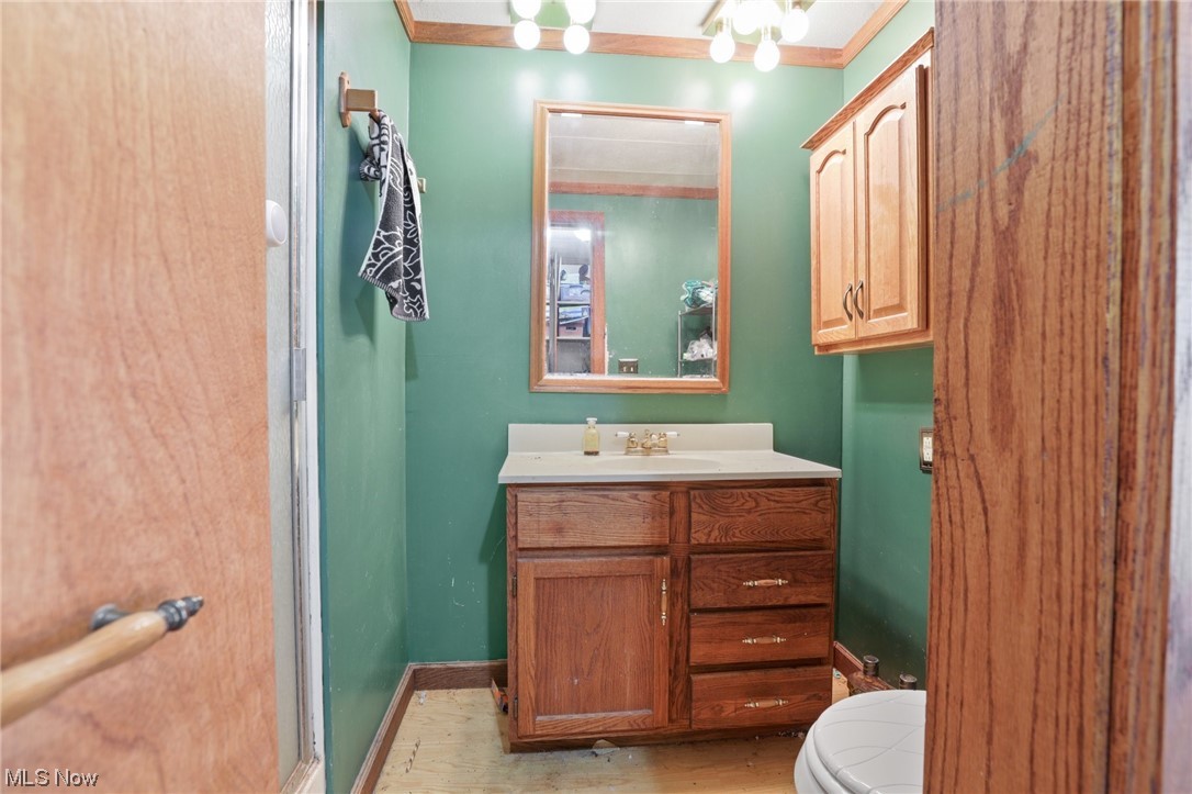 2106 Crabtree Road Albany, OH 45710 - Photo 23 of 50 Ensuite bathroom featuring crown molding