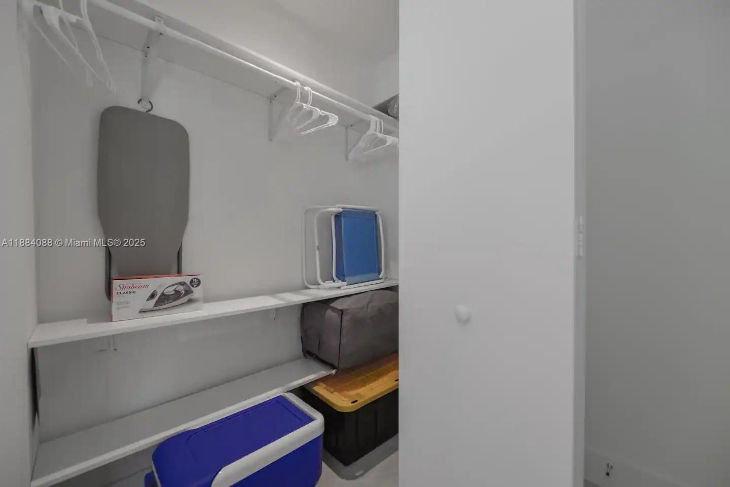 239 Southwest 9th Street, Unit 1601 Miami, FL 33130 - Photo 15 of 23 a bathroom with a sink and a mirror