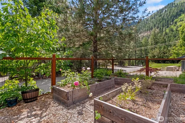 a view of a garden with an outdoor space