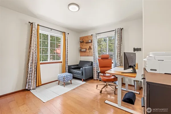 a living room with furniture and a window