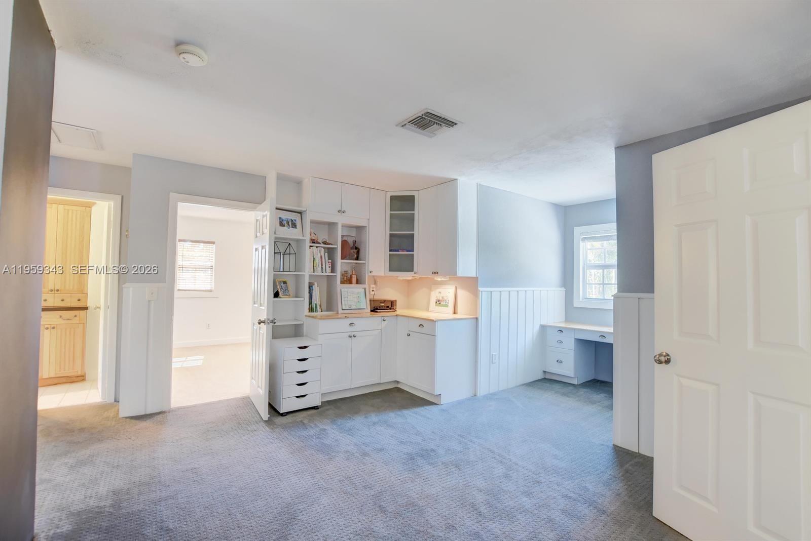 1210 Southwest 19th Street Boca Raton, FL 33486 - Photo 27 of 43 a room with furniture and closet