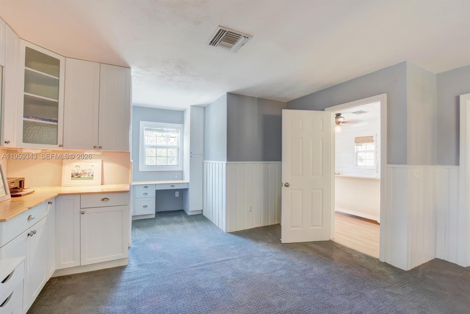 1210 Southwest 19th Street Boca Raton, FL 33486 - Photo 28 of 43 a view of a kitchen with cabinets appliances