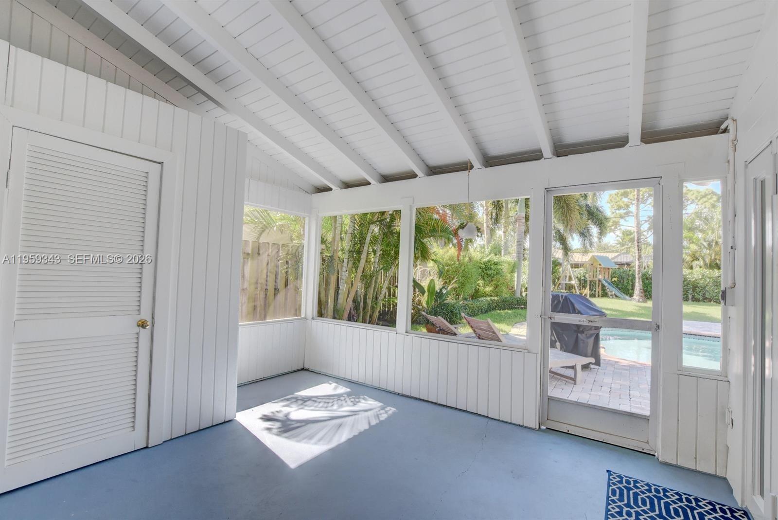 1210 Southwest 19th Street Boca Raton, FL 33486 - Photo 34 of 43 a view of an empty room with a large window