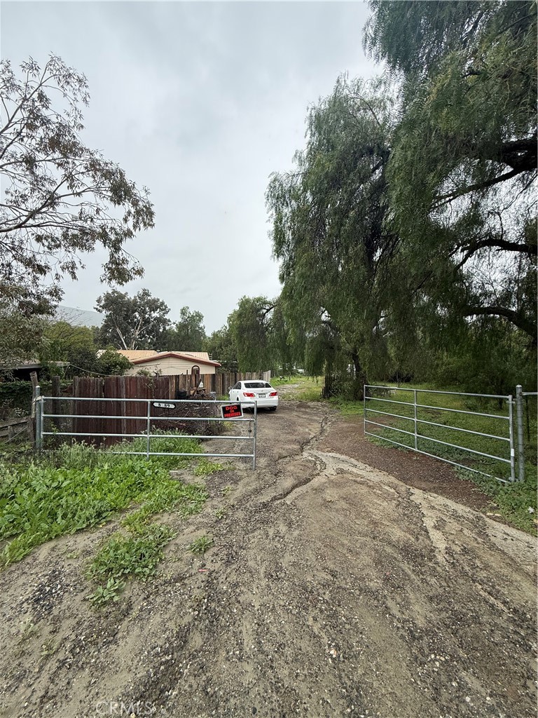 8189 Keissel Road Colton, CA 92324 - Photo 1 of 1 a view of backyard with parked car