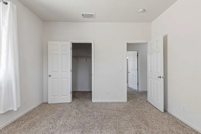 an empty room with closet