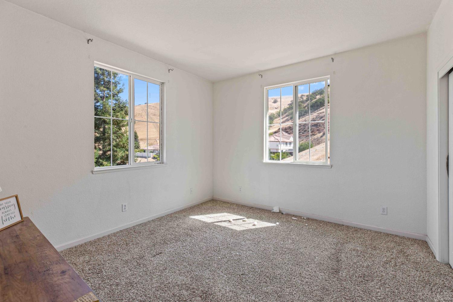 9015 Tee Patterson, CA 95363 - Photo 21 of 36 a view of an empty room with a window