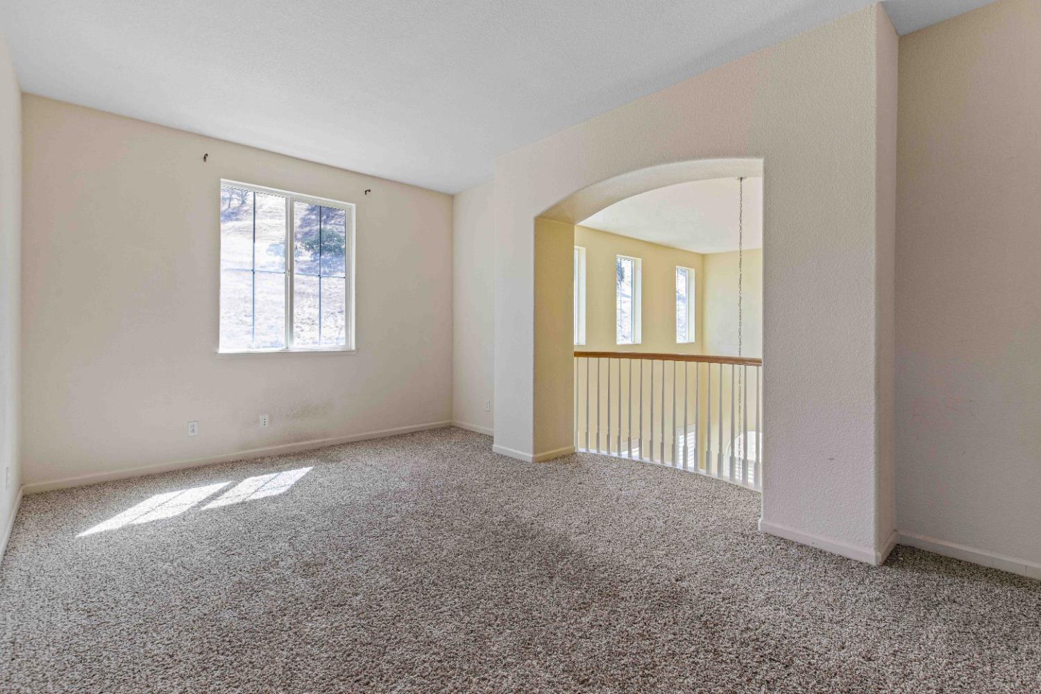 9015 Tee Patterson, CA 95363 - Photo 24 of 36 an empty room with windows