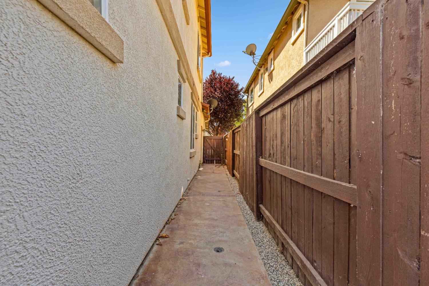 9015 Tee Patterson, CA 95363 - Photo 25 of 36 a view of a pathway of a house with wooden floor