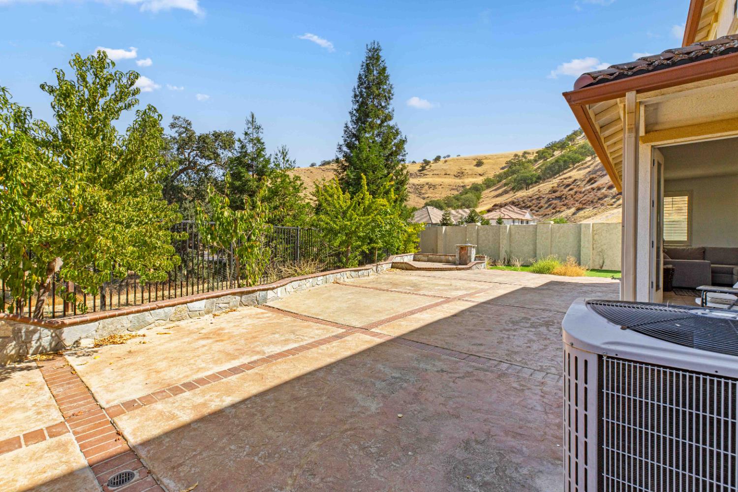 9015 Tee Patterson, CA 95363 - Photo 26 of 36 a view of backyard with a garden and trees