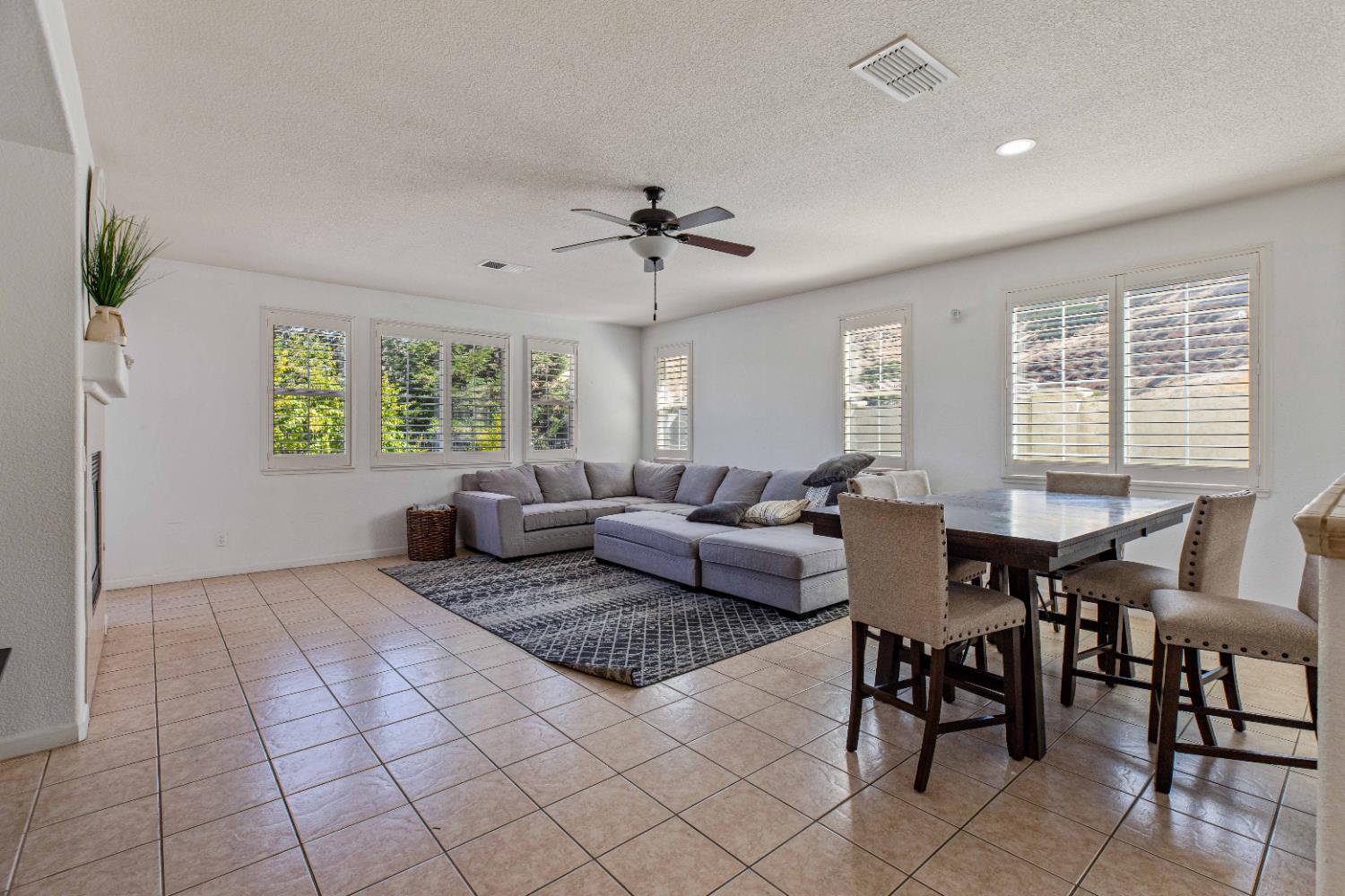 9015 Tee Patterson, CA 95363 - Photo 9 of 36 a living room with furniture and a large window