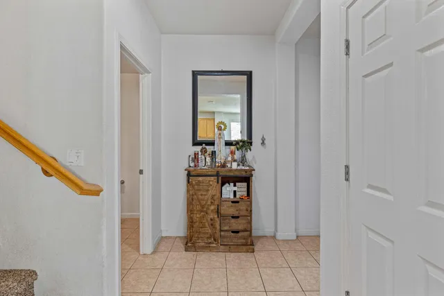 a view of an entryway with wooden floor