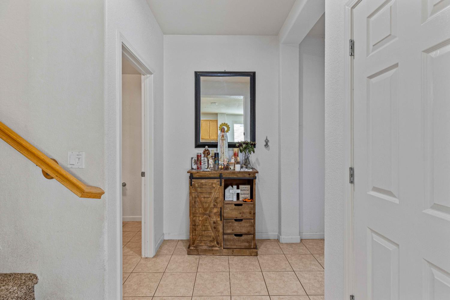 9015 Tee Patterson, CA 95363 - Photo 10 of 36 a view of an entryway with wooden floor