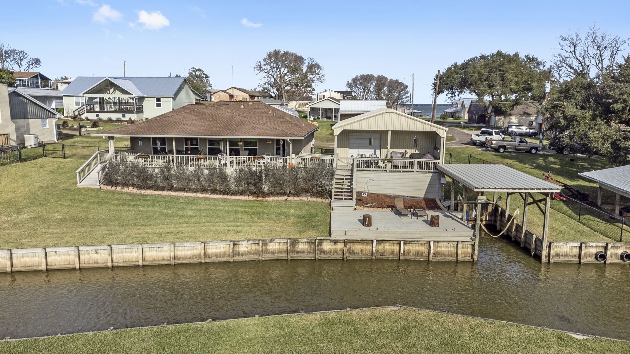 330 Crestmont Point Blank, TX 77364 - Photo 28 of 48 Aerial view of the back porch, deck, back of shop and boathouse