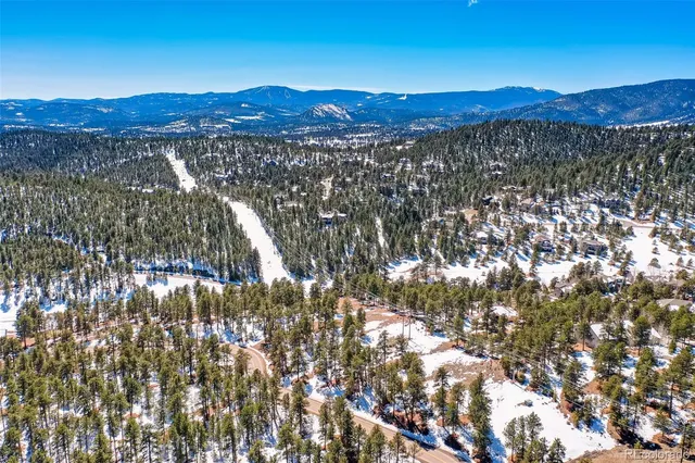 a view of a city with mountain