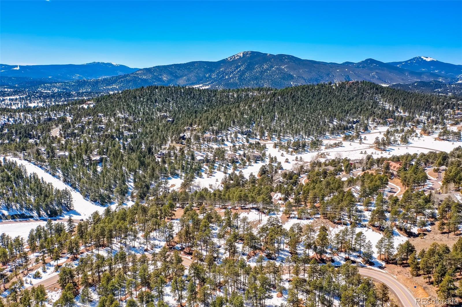 1493 Pinedale Ranch Circle Evergreen, CO 80439 - Photo 7 of 19 a view of mountain and a mountain