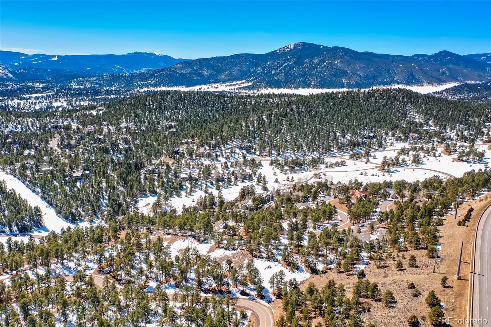1493 Pinedale Ranch Circle Evergreen, CO 80439 - Photo 9 of 19 a view of mountains and valleys