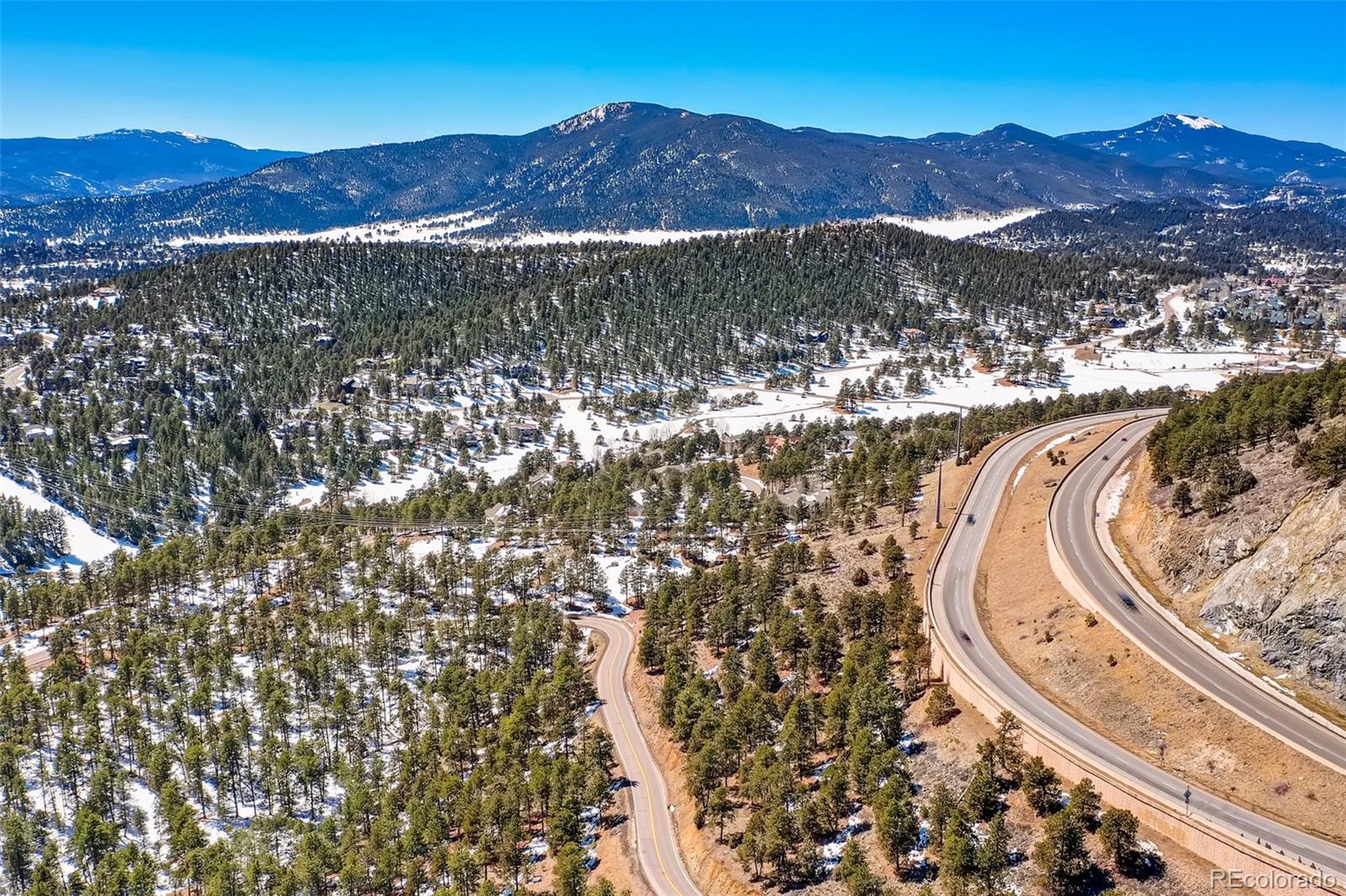 1493 Pinedale Ranch Circle Evergreen, CO 80439 - Photo 10 of 19 a view of a mountain with a mountain in the background