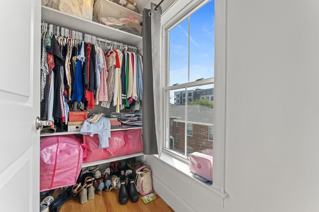 10 Mitchell Street, Unit 3 Boston, MA 02127 - Photo 12 of 15 a view of walk in closet with clothes