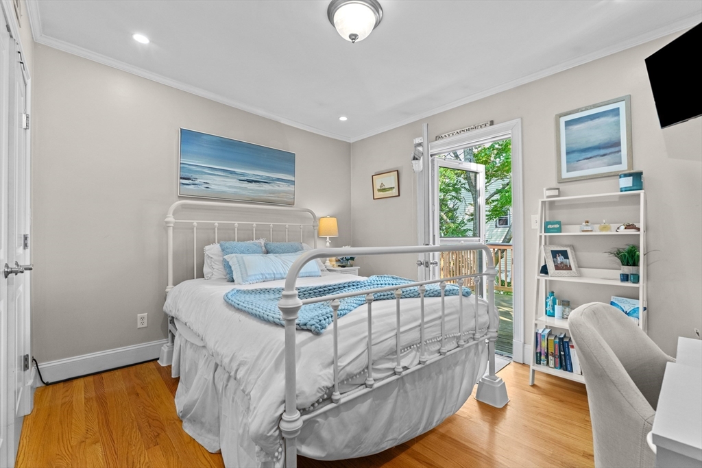 10 Mitchell Street, Unit 3 Boston, MA 02127 - Photo 13 of 15 a living room with furniture and a flat screen tv