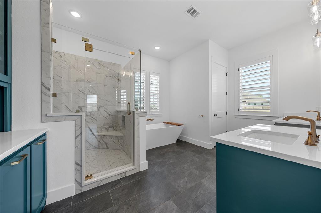 216 Wycliff Drive China Spring, TX 76633 - Photo 19 of 40 a bathroom with a granite countertop sink a toilet and shower