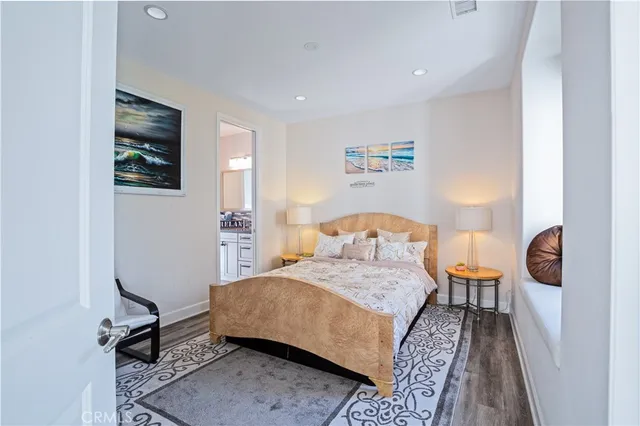 a bedroom with a bed and furniture