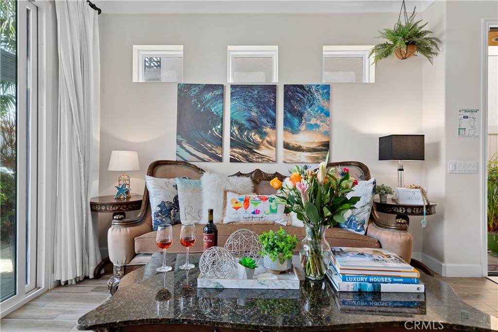 610 17th Street Huntington Beach, CA 92648 - Photo 38 of 64 a living room filled with furniture and a couch