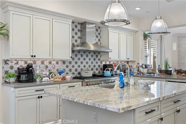 a front view of a multi story residential apartment building with a yard