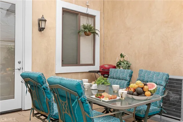 a view of washer and dryer with kitchen in the background