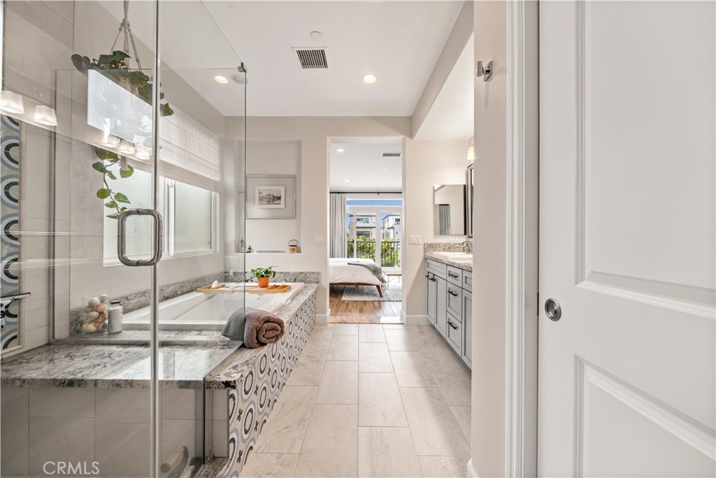 610 17th Street Huntington Beach, CA 92648 - Photo 60 of 64 a living room with furniture and a chandelier