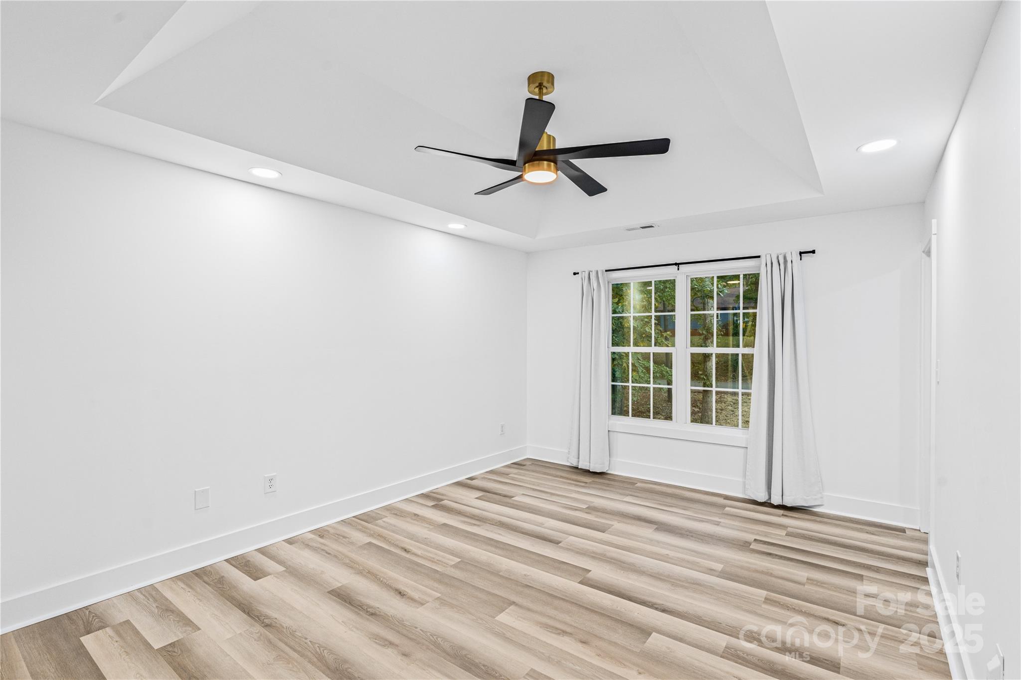 2105 Timber Ridge Road Monroe, NC 28112 - Photo 12 of 27 a view of empty room with windows