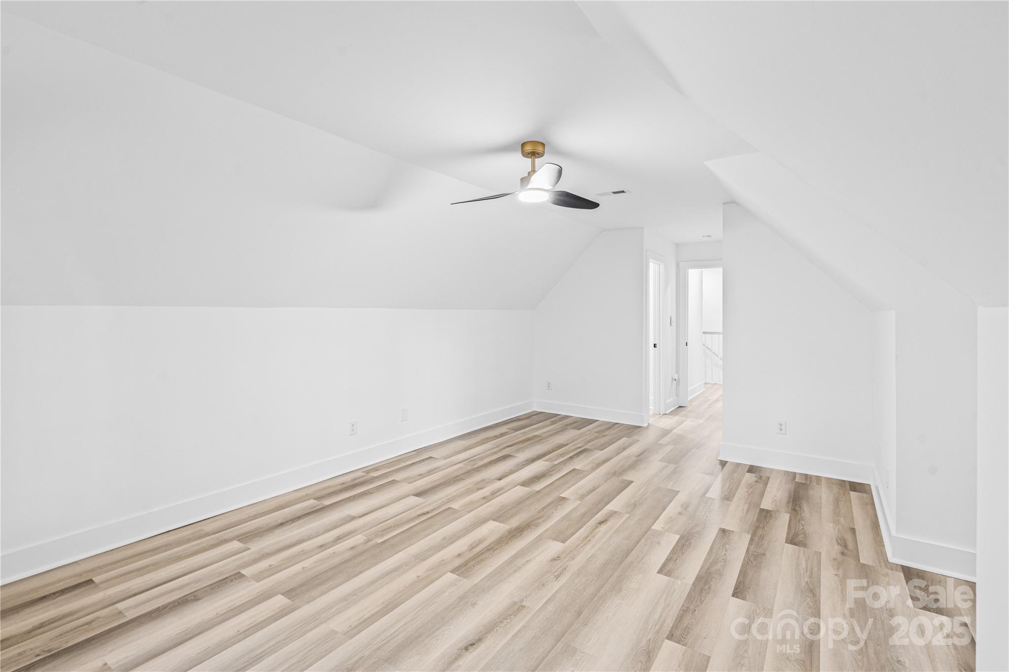 2105 Timber Ridge Road Monroe, NC 28112 - Photo 20 of 27 a view of empty room with wooden floor