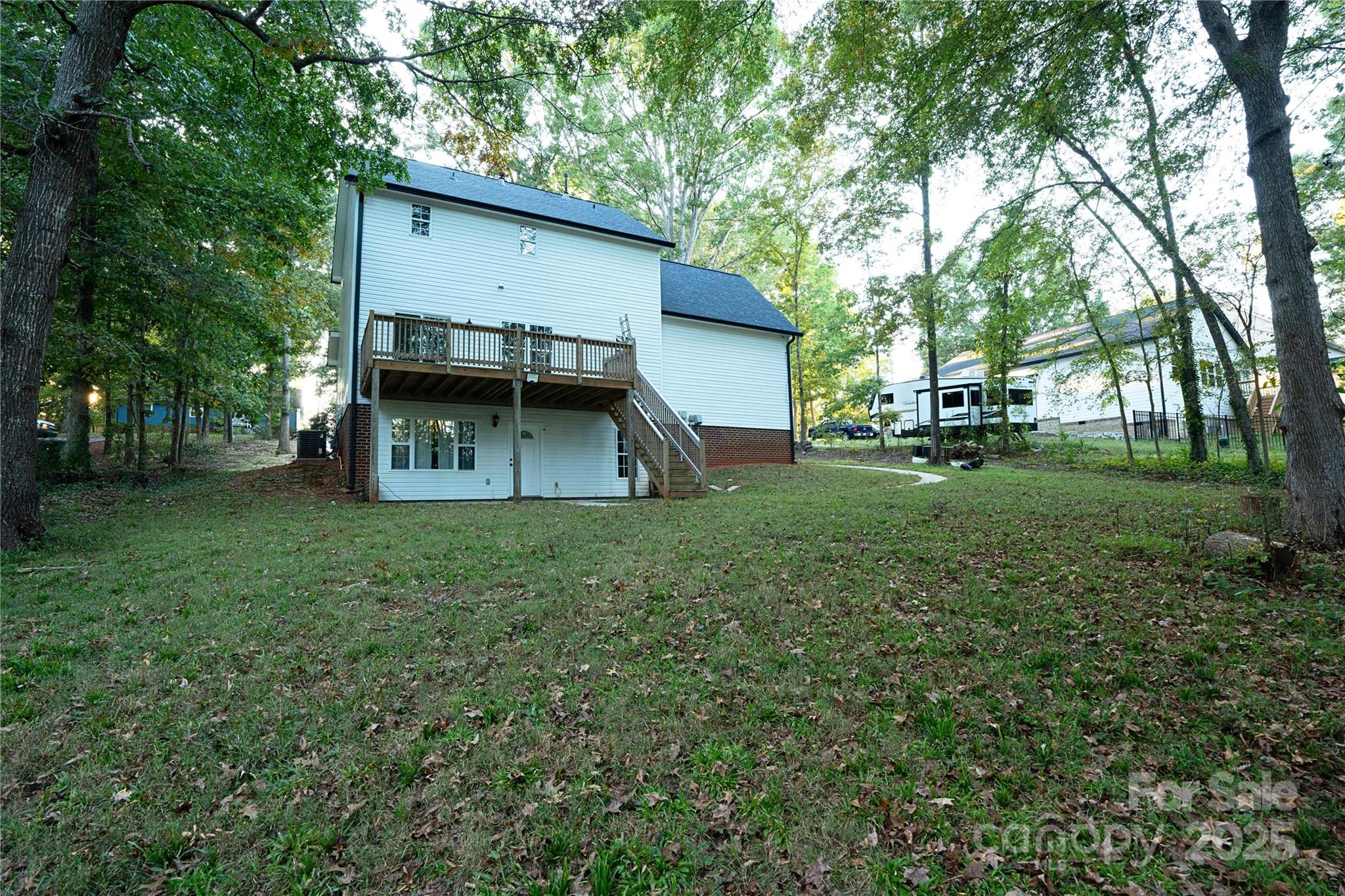 2105 Timber Ridge Road Monroe, NC 28112 - Photo 27 of 27 a view of a backyard with a garden and entertaining space
