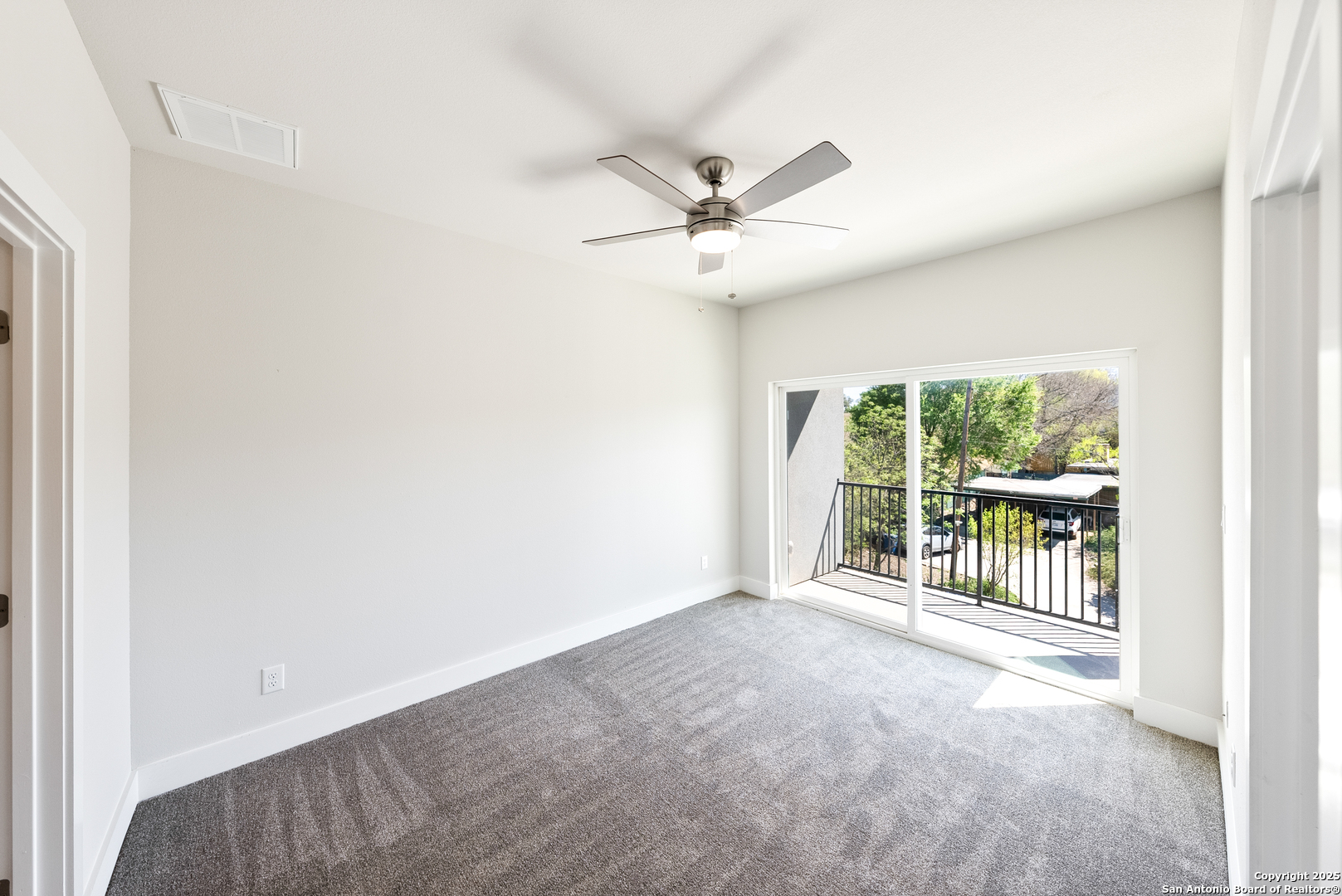 419 Ira Avenue, Unit 1101 San Antonio, TX 78209 - Photo 16 of 22 a view of a big room with wooden floor and windows