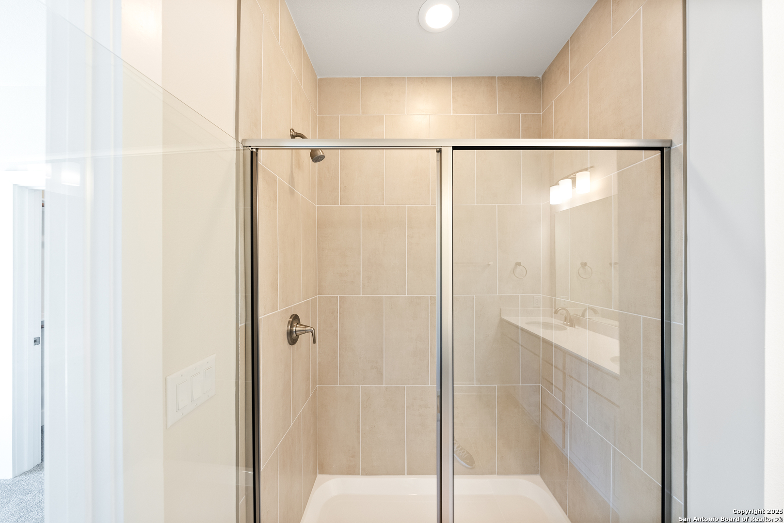 419 Ira Avenue, Unit 1101 San Antonio, TX 78209 - Photo 20 of 22 a bathroom with a shower