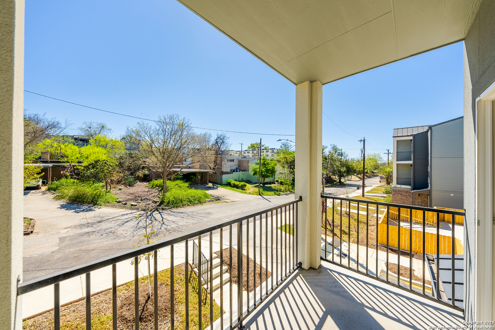 419 Ira Avenue, Unit 1101 San Antonio, TX 78209 - Photo 22 of 22 a view of a street from a balcony