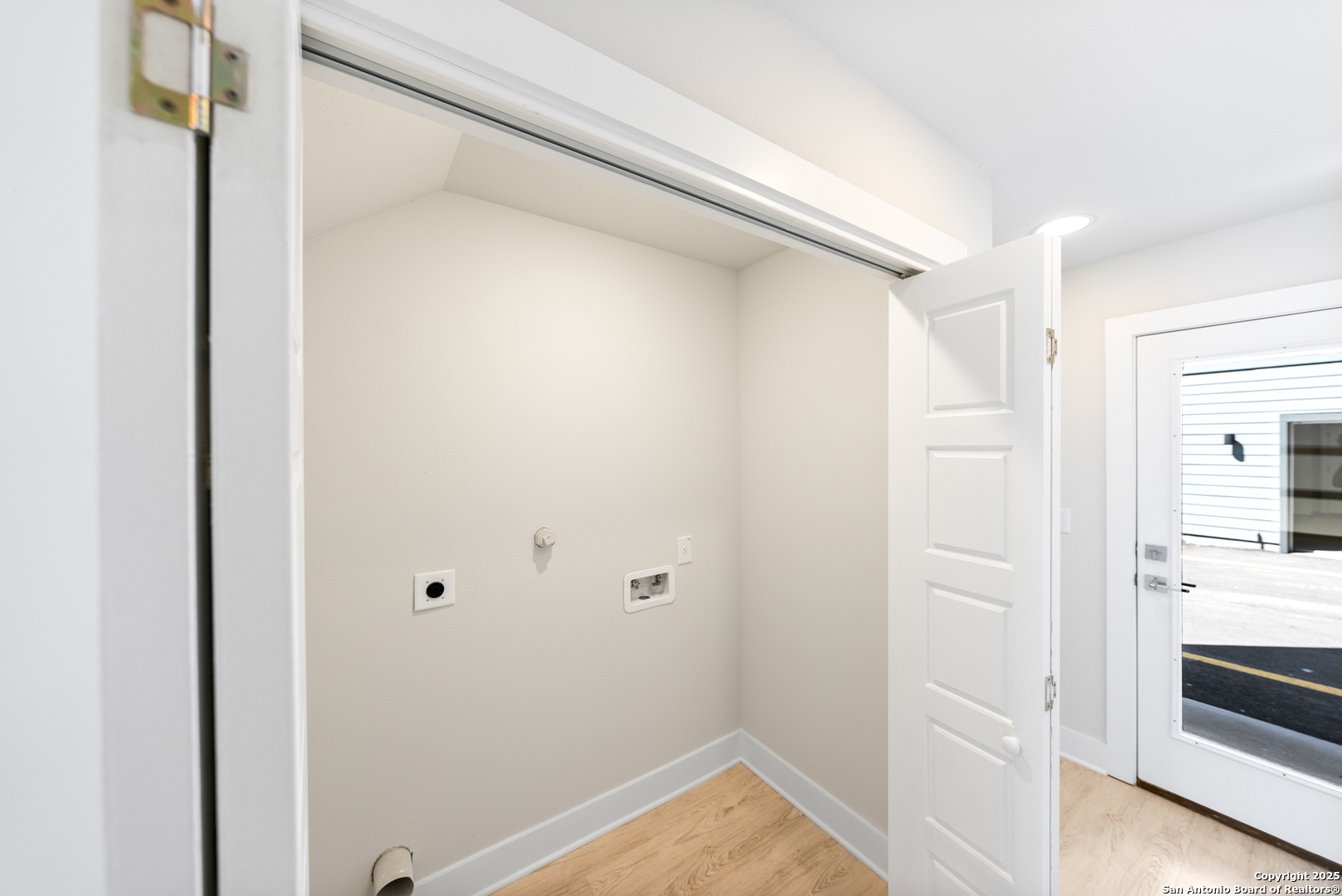 419 Ira Avenue, Unit 1101 San Antonio, TX 78209 - Photo 6 of 22 a view of walk in closet with empty racks