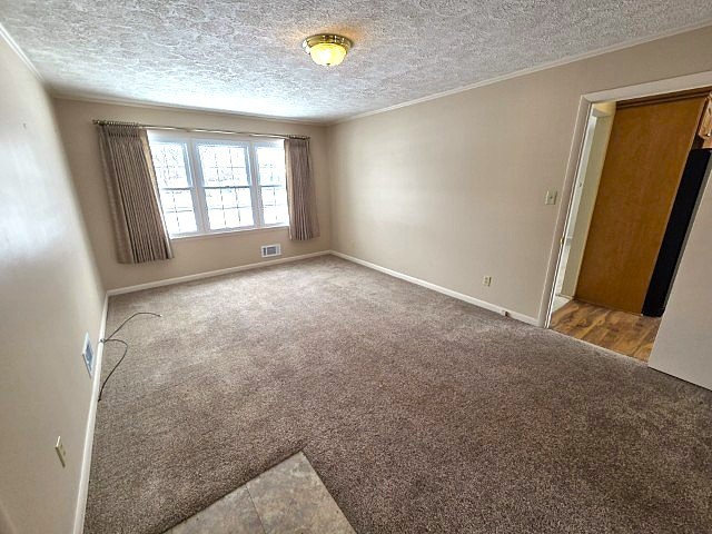 2908 Jamison Boulevard Mount Vernon, IL 62864 - Photo 21 of 40 an empty room with windows