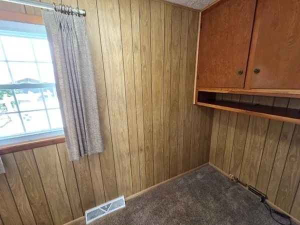 a view of a window and a door