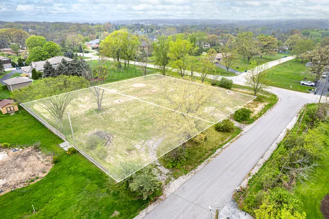 a view of a lake with a big yard