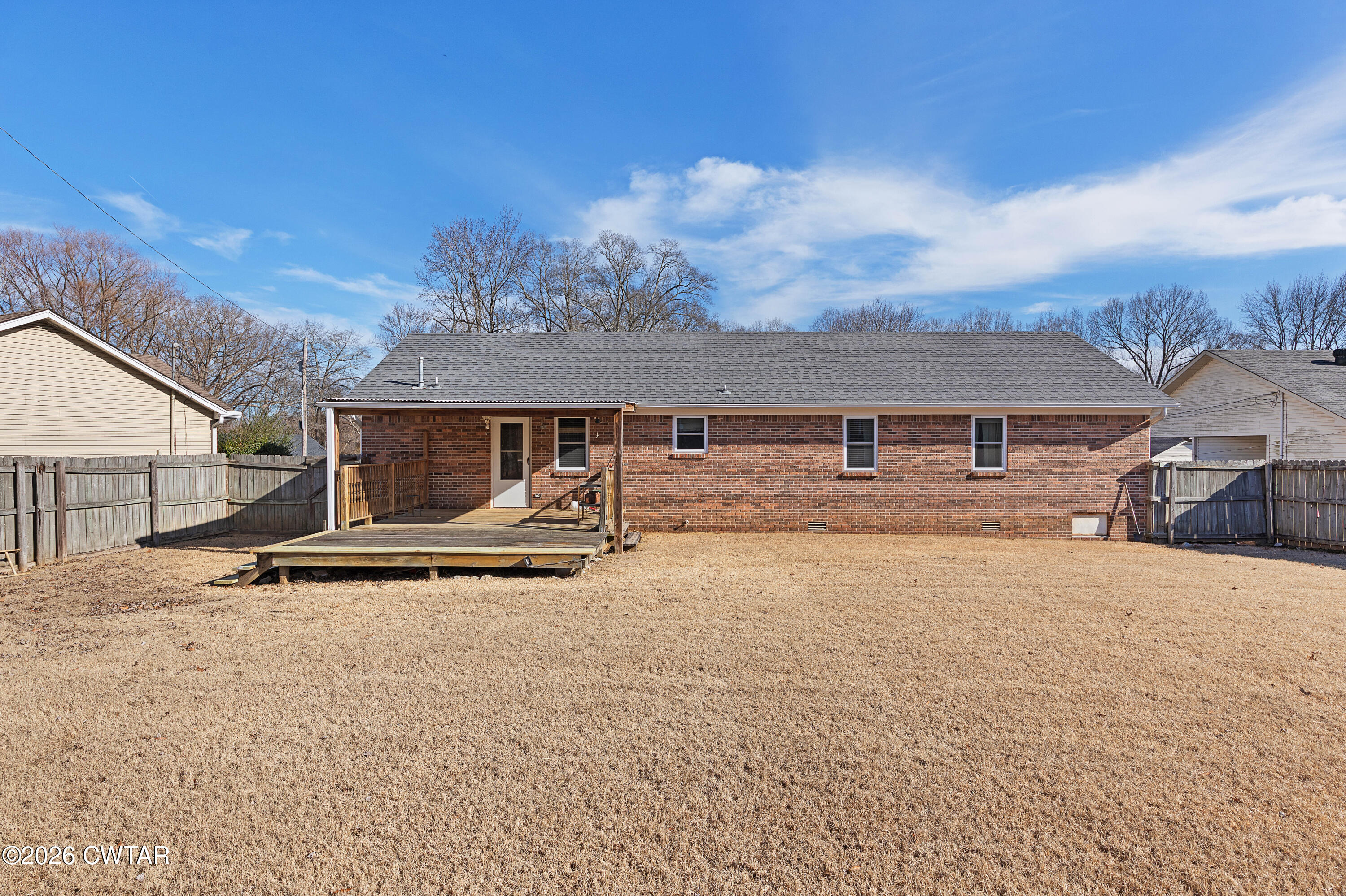 47 Roxy Cove Jackson, TN 38301 - Photo 4 of 18 a front view of a house with a yard and garage