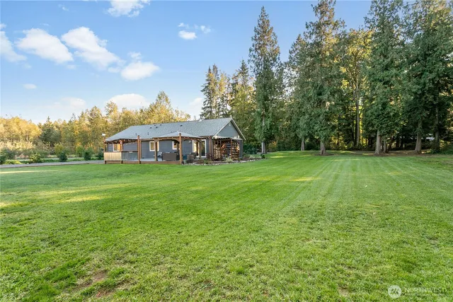 a view of a house with a big yard