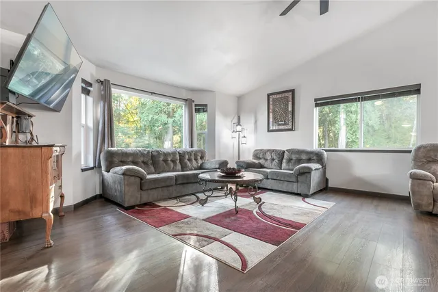 a living room with furniture and a window
