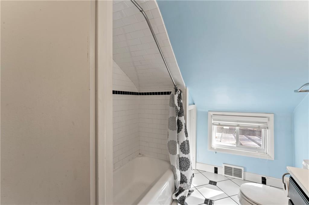 615 Midway Drive Beaver, PA 15009 - Photo 18 of 30 a bathroom with a bathtub and a shower