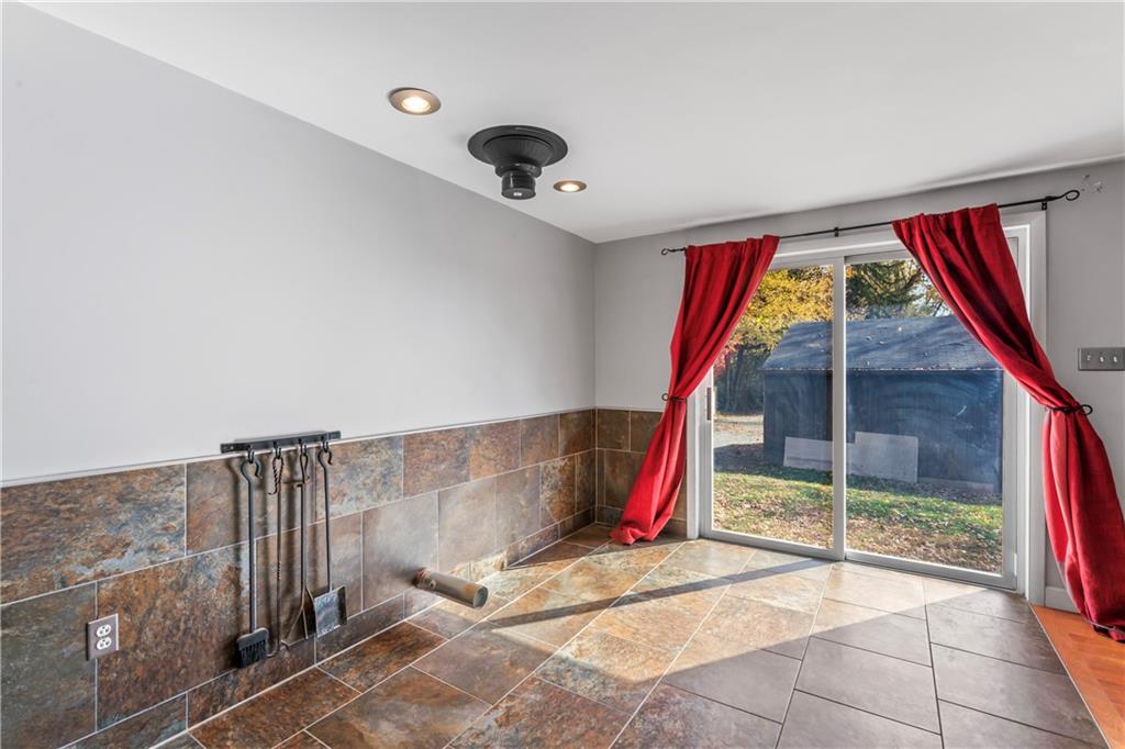 615 Midway Drive Beaver, PA 15009 - Photo 10 of 30 a view of a room with wooden floor and windows