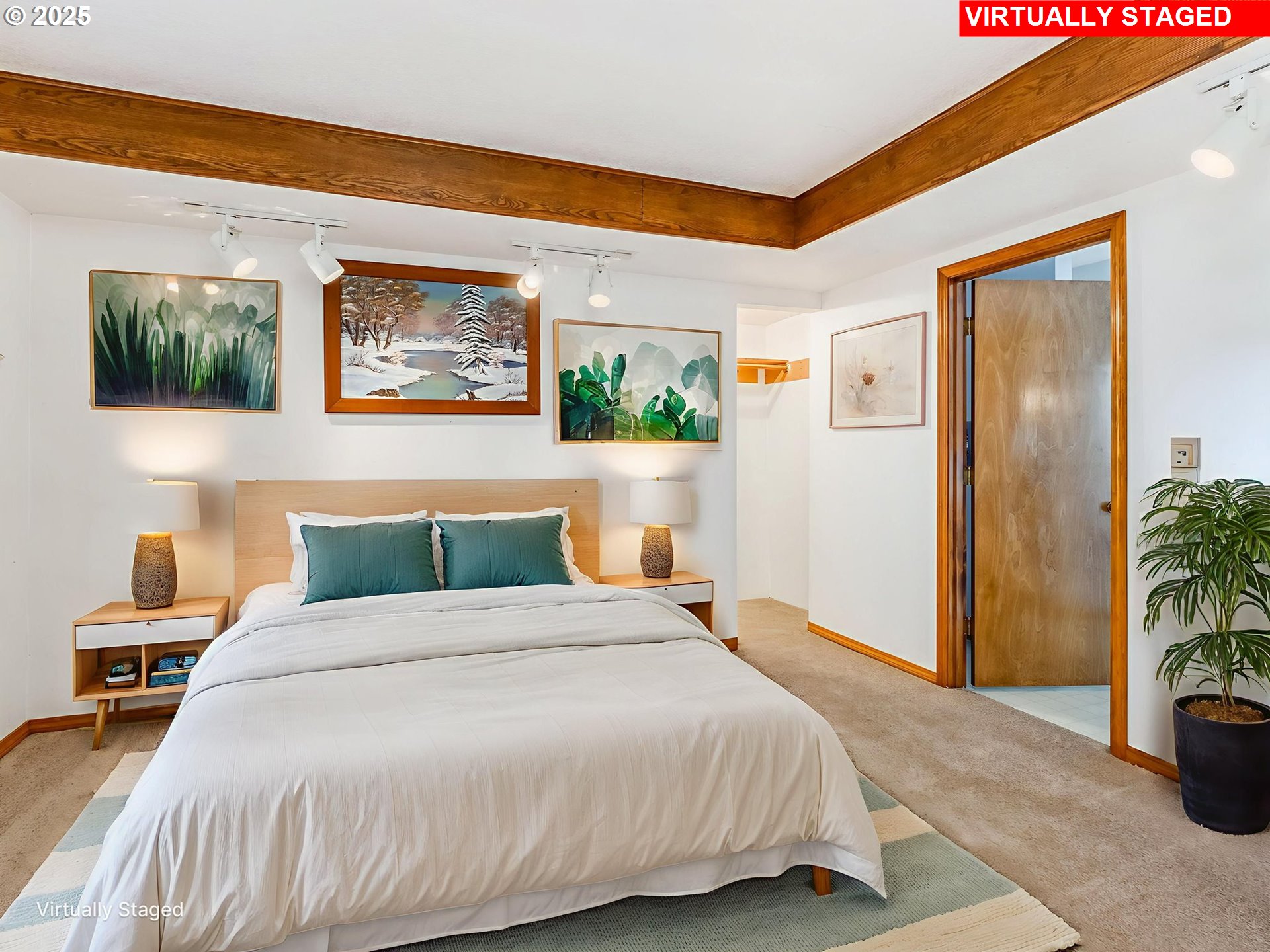 458 West Hayes Street Woodburn, OR 97071 - Photo 13 of 22 a bedroom with a bed and a potted plant