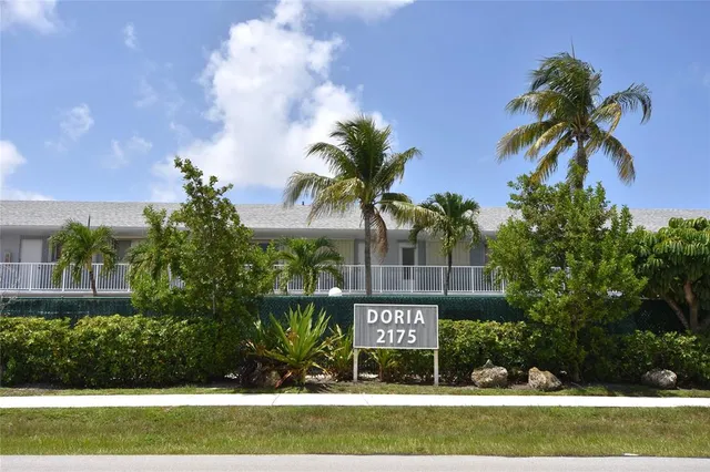 a view of sign board and yard