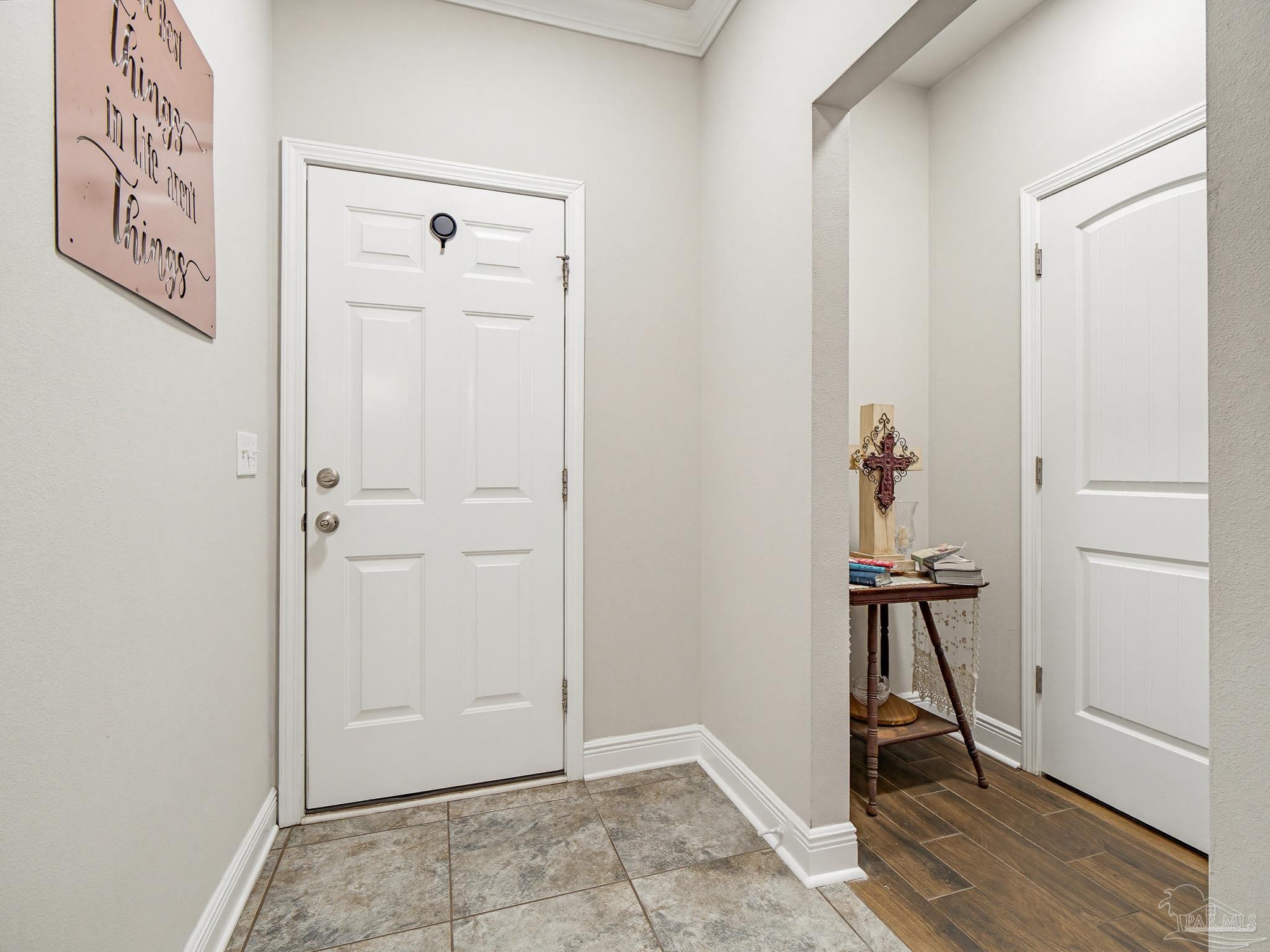 6294 Ladera Trail Pace, FL 32571 - Photo 15 of 50 a view of an entryway with wooden floor